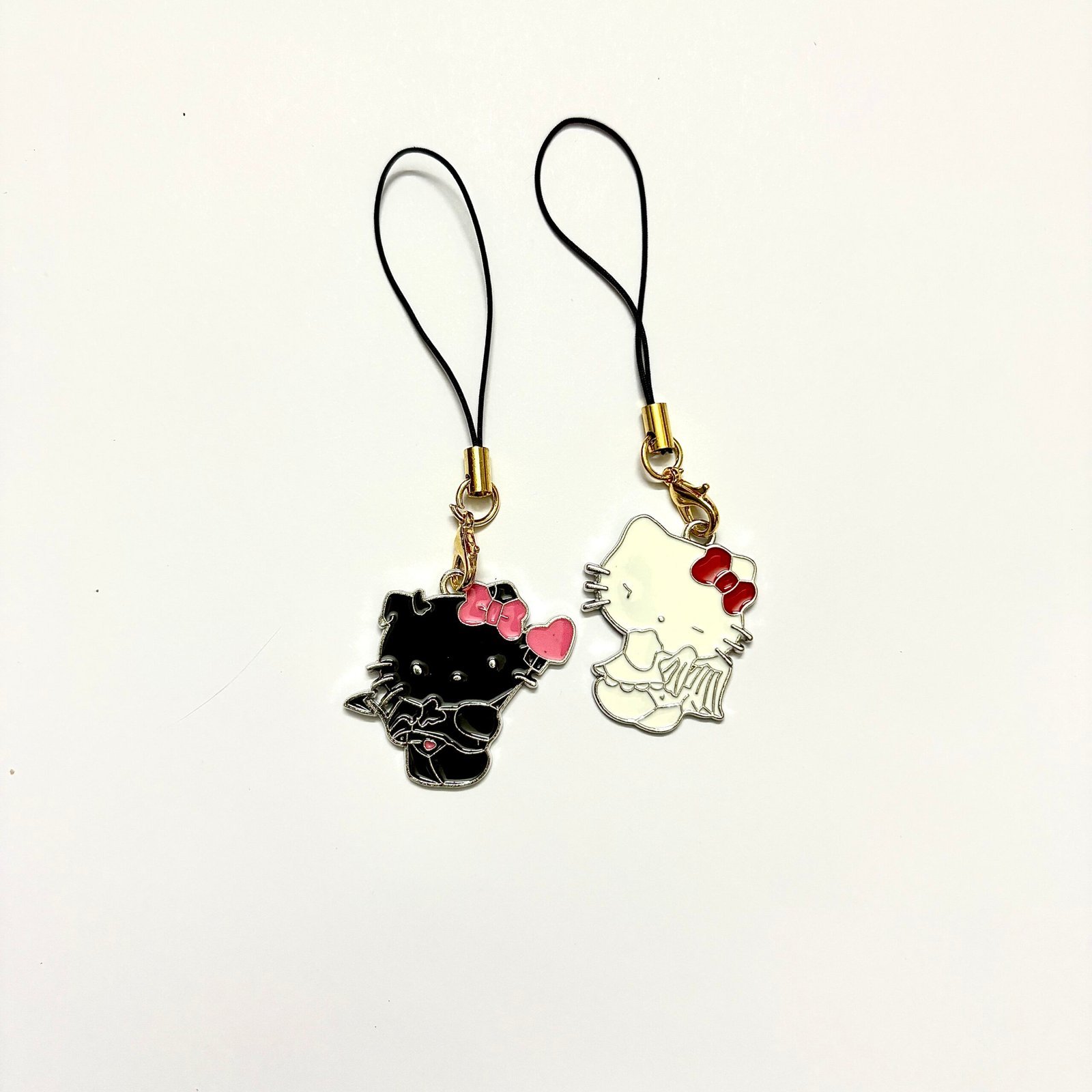 IMG_1683-scaled-1.jpeg Black White Hello Kitty Phone Charms - Image 1