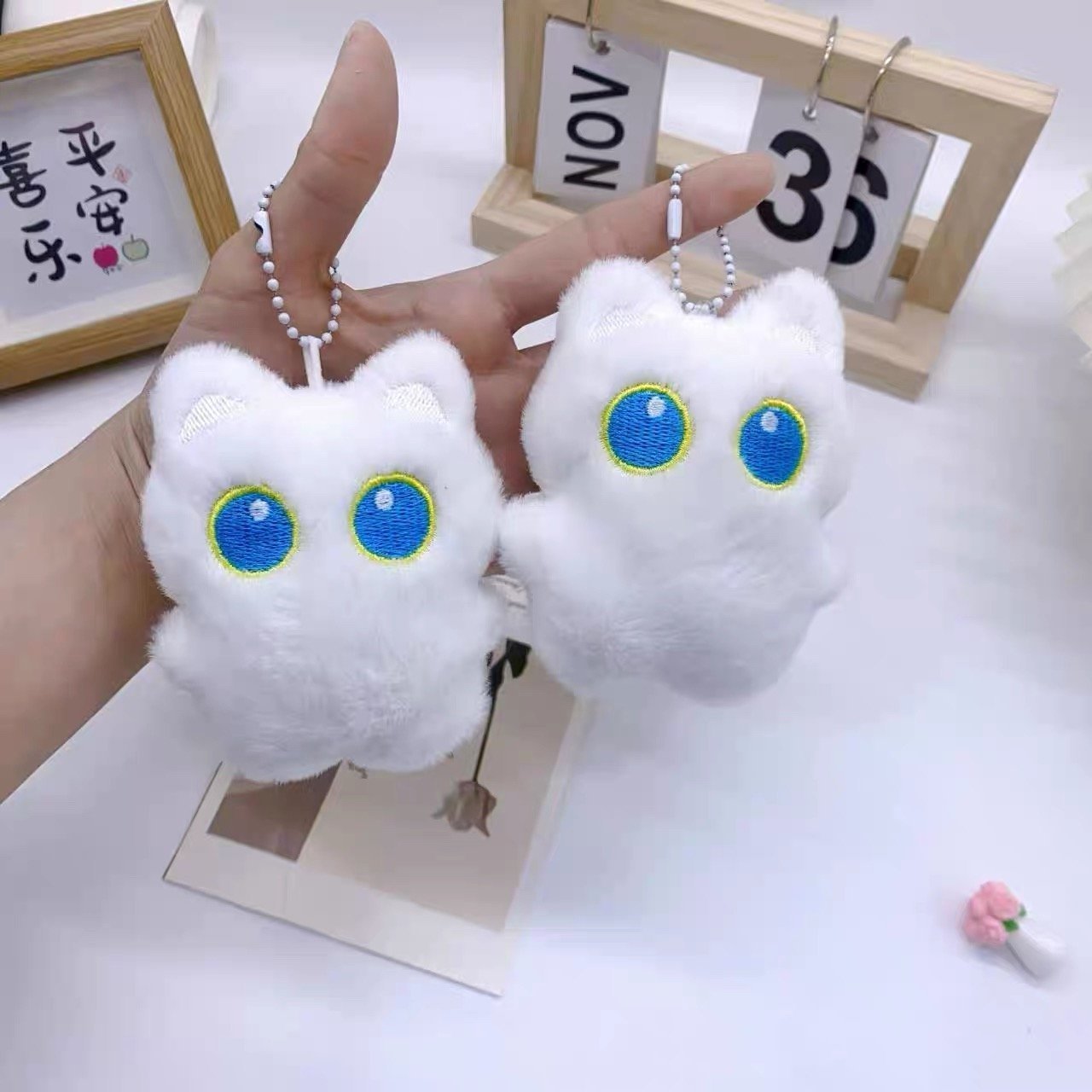 IMG_7124.jpeg Cute White Cat Plush Bag Pendant - Image 1
